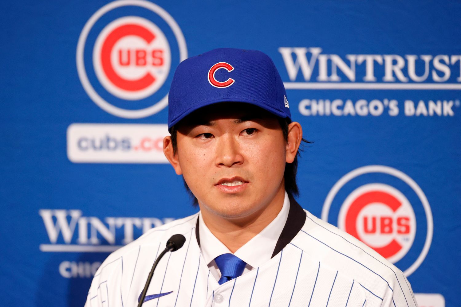 Jan 12, 2024; Chicago, IL, USA; Chicago Cubs newly signed pitcher Shota Imanaga (center) speaks during a press conference at Loews Chicago Hotel.